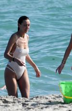 ALANA and MARIELLE HADID in Bikinis at a Beach in Miami 11/21/2018
