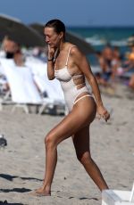 ALANA and MARIELLE HADID in Bikinis at a Beach in Miami 11/21/2018