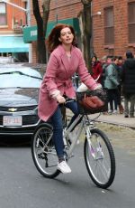 ANNE HATHAWAY Riding a Bike on the Set of Modern Love in New York 11/28/2018