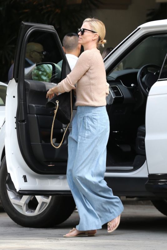 CHARLIZE THERON Out and About in Beverly Hills 11/04/2018