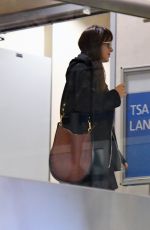 DAKOTA JOHNSON at Los Angeles International Airport 11/17/2018