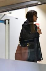DAKOTA JOHNSON at Los Angeles International Airport 11/17/2018