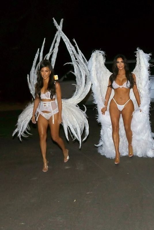 KIM, KOURTNEY and KHLOE KARDASHIAN and KENDALL and KYLIE JENNER as Angels for Halloween in Los Angeles 10/31/2018