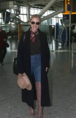 KYLIE MINOGUE at Heathrow Airport in London 11/08/2018