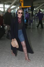 KYLIE MINOGUE at Heathrow Airport in London 11/08/2018
