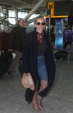 KYLIE MINOGUE at Heathrow Airport in London 11/08/2018