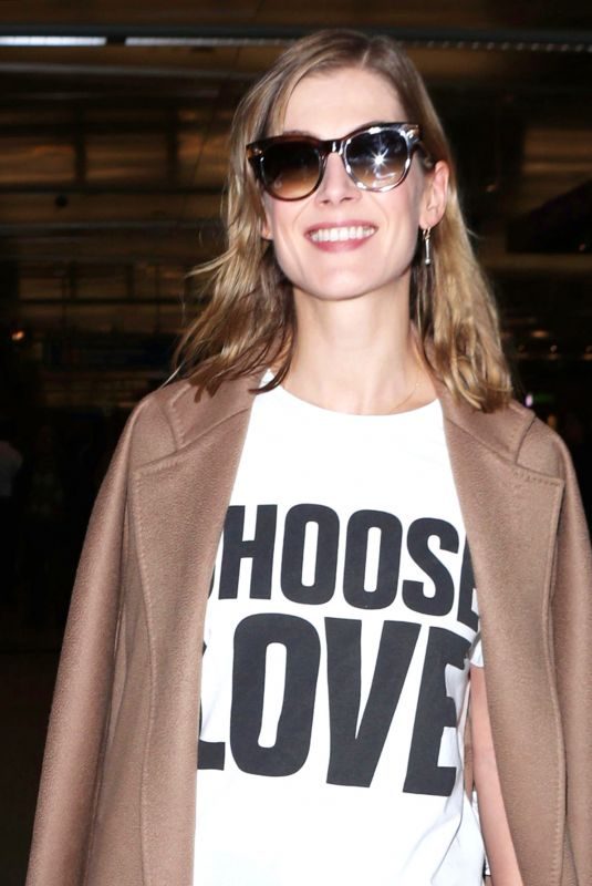 ROSAMUND PIKE at LAX Airport in Los Angeles 11/17/2018