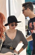 SARAH HYLAND and Wells Adams Shopping at Farmer
