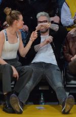 ADAM LEVINE and Behati Prinsloo at LA Lakers vs Pelicans Game in Los Angeles 12/21/2018