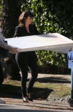 AMANDA SEYFRIED Has Art Frame Delivered to Her Home in Los Angeles 11/30/2018