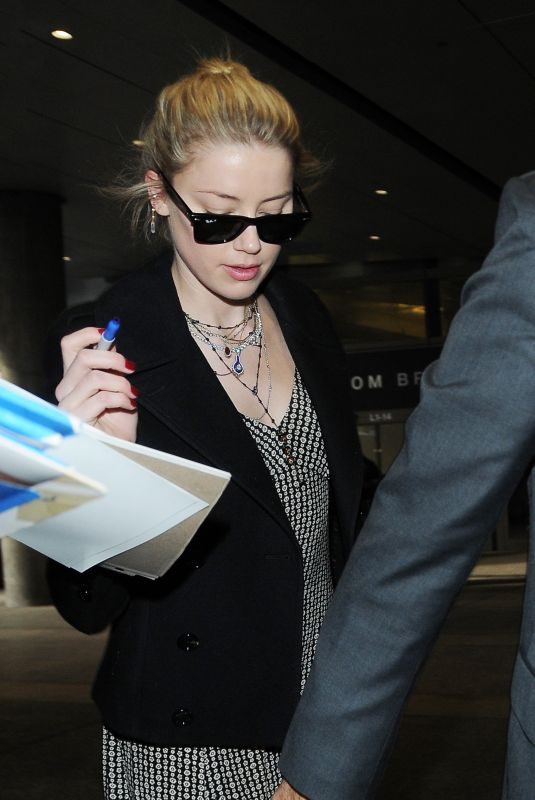 AMBER HEARD at LAX Airport in Los Angeles 12/12/2018