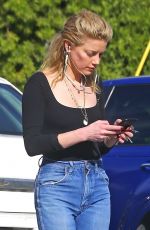 AMBER HEARD in Ripped jeans at Cafe D