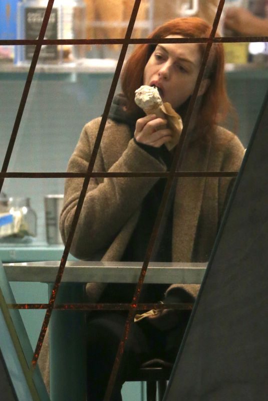 ANNE HATHAWAY Licks Ice Cream on the Set of Modern Love in New York 11/28/2018