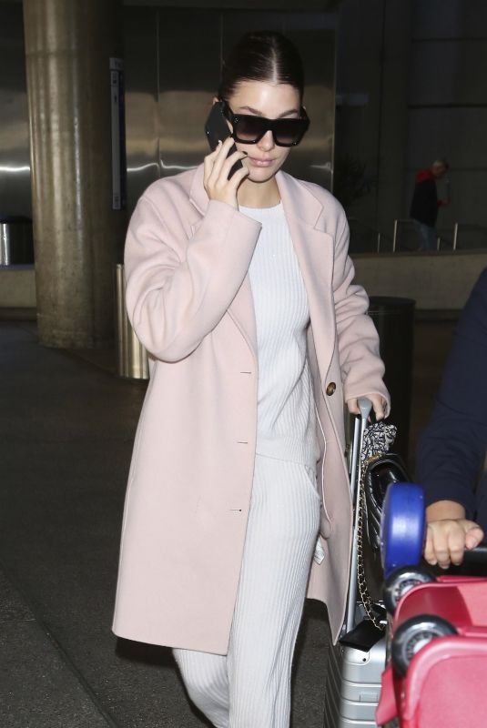 CAMILA MORRONE at Los Angeles International Airport 12/04/2018