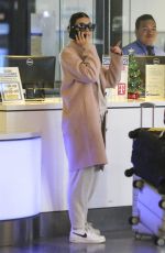 CAMILA MORRONE at Los Angeles International Airport 12/04/2018