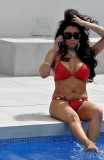 CHRISIE WUNNA in Bbikini at a Pool in Spain 12/30/2018