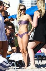 CORINNE OLYMPIOS in Bikini at a Beach in Miami 12/25/2018