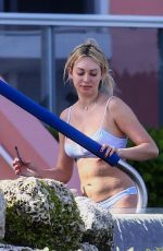 CORINNE OLYMPIOS in Bikini at a Pool in Miami 12/25/2018
