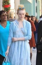 DAKOTA and ELLE FANNING Shopping on Rodeo Drive in Beverly Hills 12/26/2018