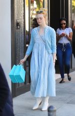 DAKOTA and ELLE FANNING Shopping on Rodeo Drive in Beverly Hills 12/26/2018