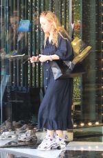 DAKOTA and ELLE FANNING Shopping on Rodeo Drive in Beverly Hills 12/26/2018