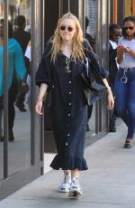 DAKOTA and ELLE FANNING Shopping on Rodeo Drive in Beverly Hills 12/26/2018