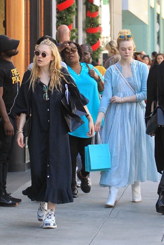 DAKOTA and ELLE FANNING Shopping on Rodeo Drive in Beverly Hills 12/26/2018