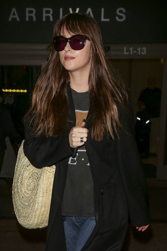 DAKOTA JOHNSON at LAX Airport in Los Angeles 12/10/2018