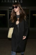 DAKOTA JOHNSON at LAX Airport in Los Angeles 12/10/2018
