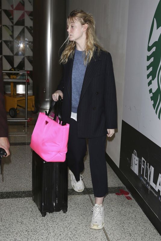 ELLE FANNING at Los Angeles International Airport 12/18/2018