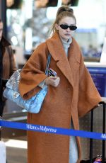 GIGI HADID Arrives at Airport in Milan 12/06/2018