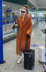 GIGI HADID Arrives at Airport in Milan 12/06/2018