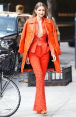 GIGI HADID Leaves Vogue Promo Tour in New York 12/11/2018