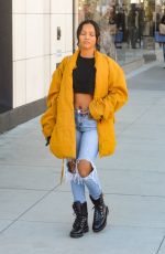 KARRUECHE TRAN in Ripped Jeans Out Shopping in Beverly Hills 12/28/2018