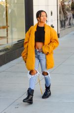 KARRUECHE TRAN in Ripped Jeans Out Shopping in Beverly Hills 12/28/2018