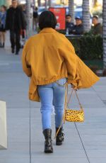 KARRUECHE TRAN in Ripped Jeans Out Shopping in Beverly Hills 12/28/2018