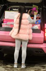 KATIE PRICE Shopping at a Toy Store in Brighton 12/21/2018