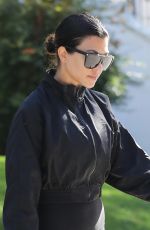 KOURTNEY KARDASHIAN Leaves a Friend