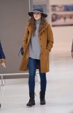 LILY COLLINS at JFK Airport in New York 12/02/2018