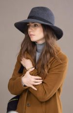 LILY COLLINS at JFK Airport in New York 12/02/2018