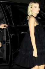MARGOT ROBBIE Arrives at Chanel Metiers D