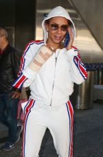 MELANIE BROWN at LAX Airpost After Fracturing Two Ribs 12/21/2018