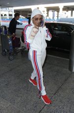 MELANIE BROWN at LAX Airpost After Fracturing Two Ribs 12/21/2018