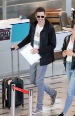 MILLA JOVOVICH and Paul W.S. Anderson at Cape Town International Airport 12/15/2018