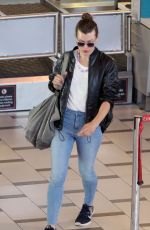 MILLA JOVOVICH and Paul W.S. Anderson at Cape Town International Airport 12/15/2018