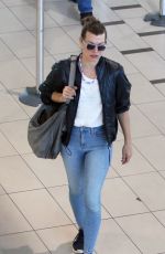 MILLA JOVOVICH and Paul W.S. Anderson at Cape Town International Airport 12/15/2018