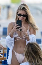 NATASHA OAKLEY in Bikini at a Beach in Miami 12/07/2018