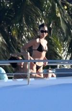 OLIVIA CULPO and CARA SANTANA in Bikiis at a Yacht in Miami 12/30/2018