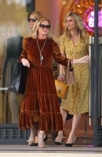 PARIS and NICKY HILTON Shopping at Barney