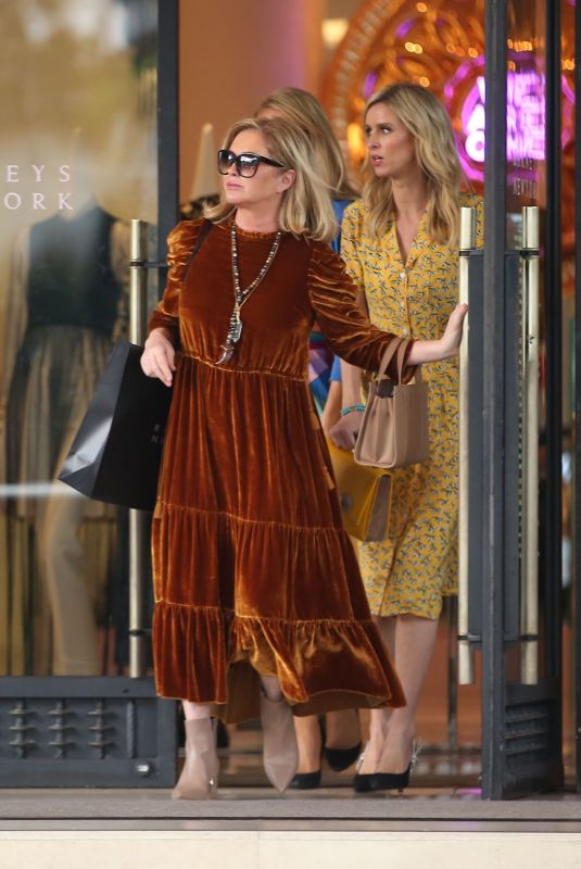 PARIS and NICKY HILTON Shopping at Barney